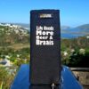 The braai grid handle sleeve with the following saying on it: "Life needs more beer and braais"