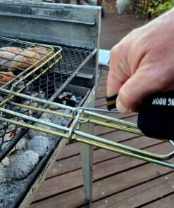 The braai grid handle sleeve hook. The hook pulls the hot ring off the handle