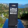 A braai grid handle sleeve / sock - With the following saying on: "1st Rule of braaing. If you can't stand the heat, go get me a beer.