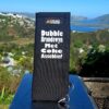 A braai grid handle sleeve / sock - With the following saying on: "Dubble Brandewyn met coke asseblief"